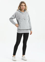 Kei Tomlison pouch hoodie pouch open with pet illustrates easy access and comfort.