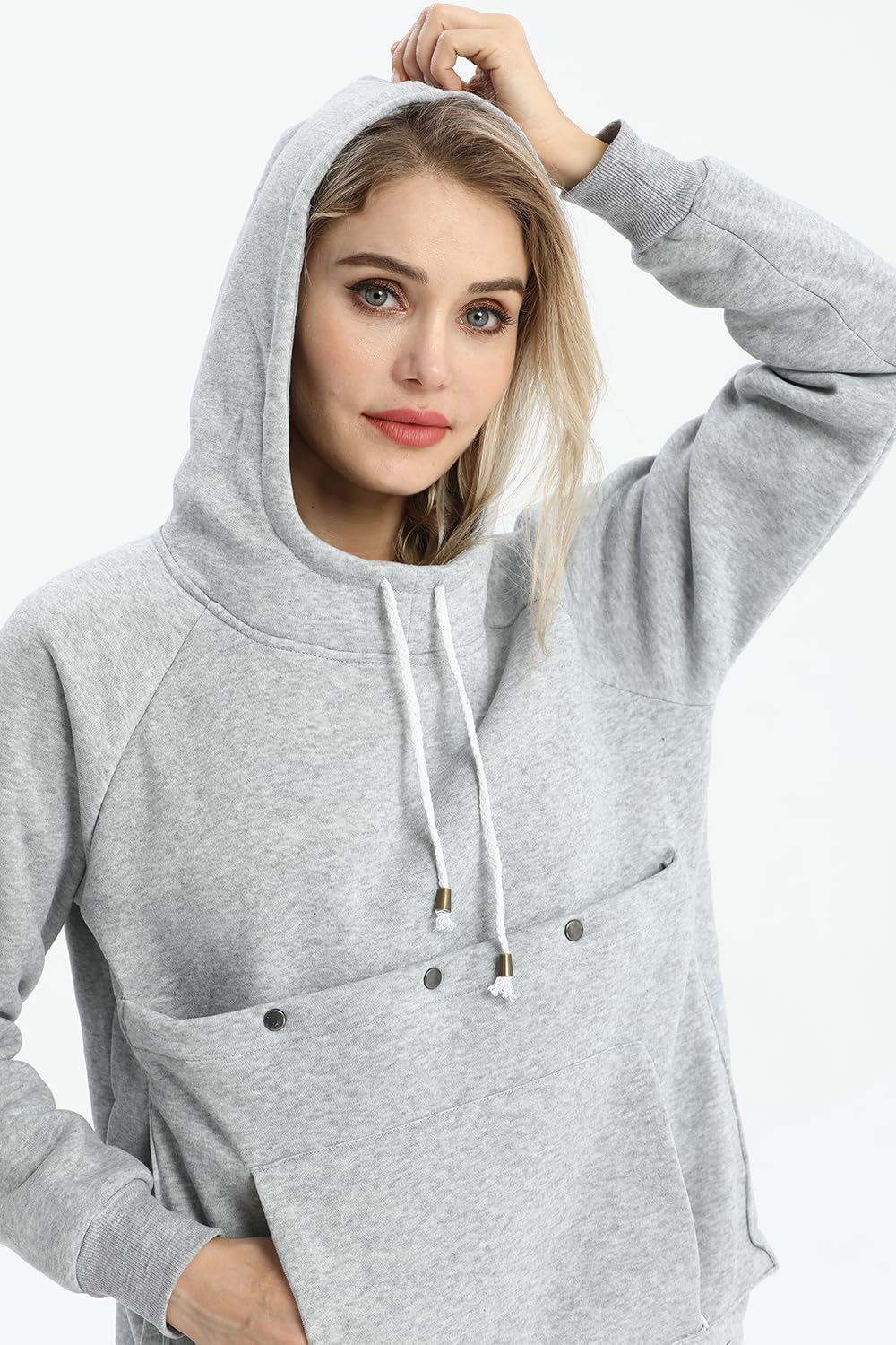 Kei Tomlison pouch hoodie worn on model demonstrates unisex casual fit.