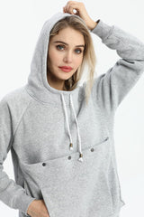 Kei Tomlison pouch hoodie worn on model demonstrates unisex casual fit.