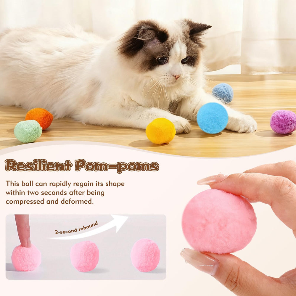 Kerros cat chasing pom poms, stimulating hunting instincts with gentle reactivity.