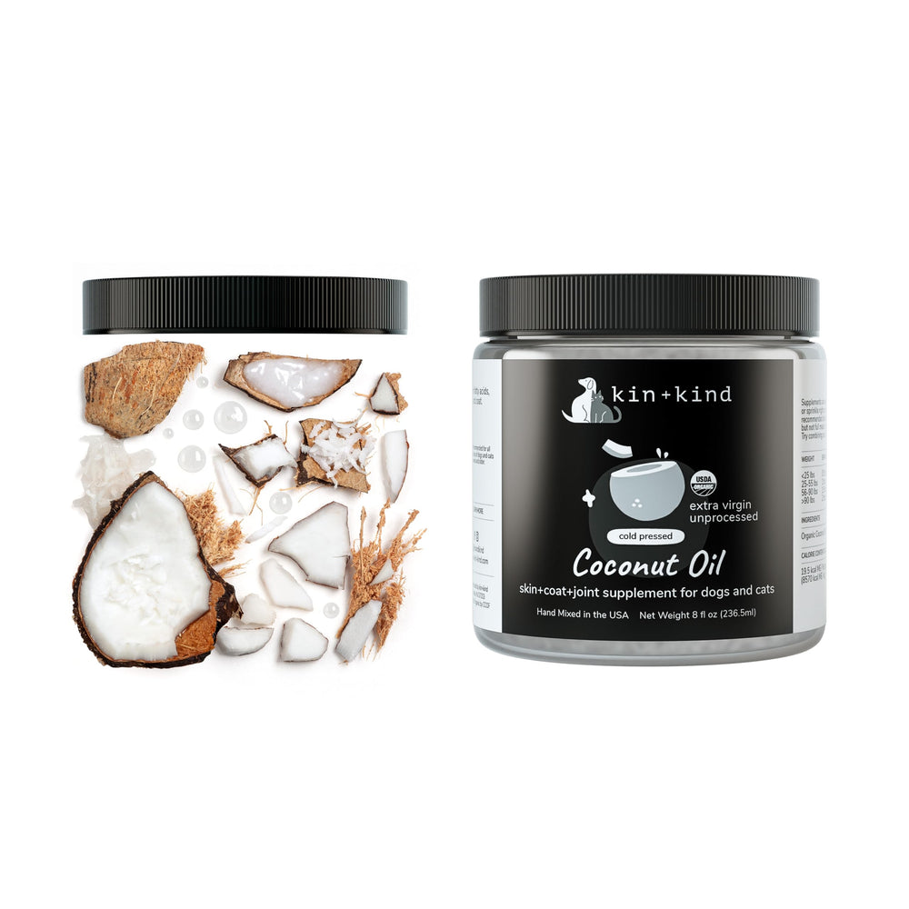 Kin-kind coconut oil on paw for topical moisture during grooming.