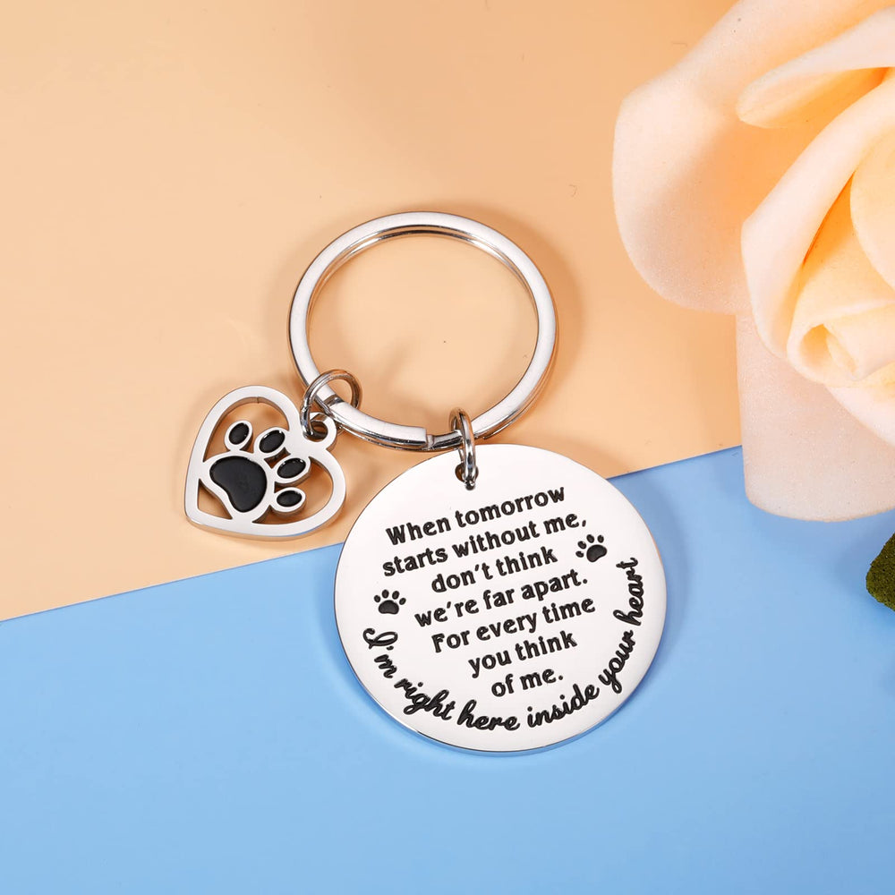 KINMES engraved-message back shows lasting memory of a furry companion.
