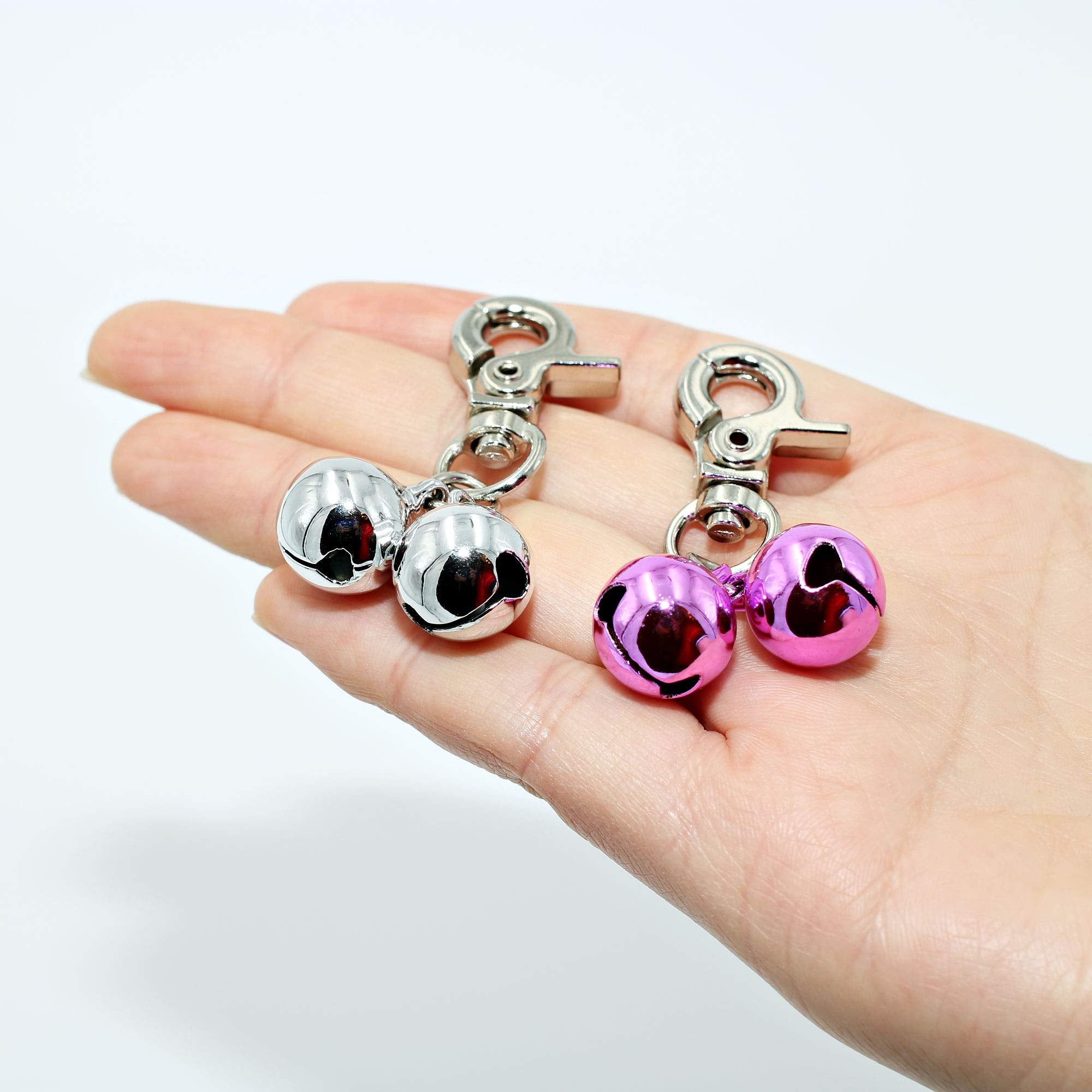 KITTAIL silver and pink bells add stylish, high-contrast pet accessories for everyday wear.