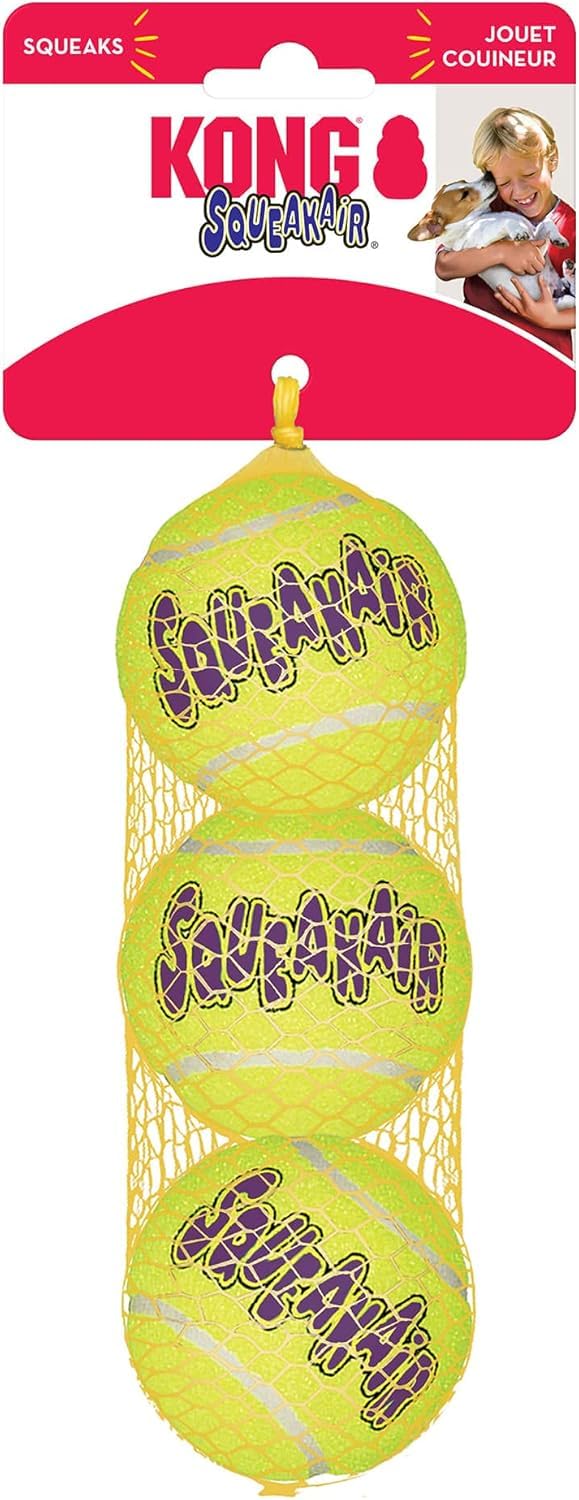 KONG Air Dog SqueakAir ball on the floor ready for interactive play.