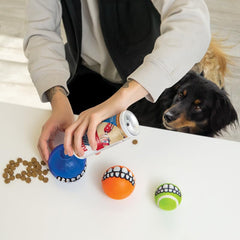 KONG Grinz treat ball demonstrates stuffing treats for extended challenge.