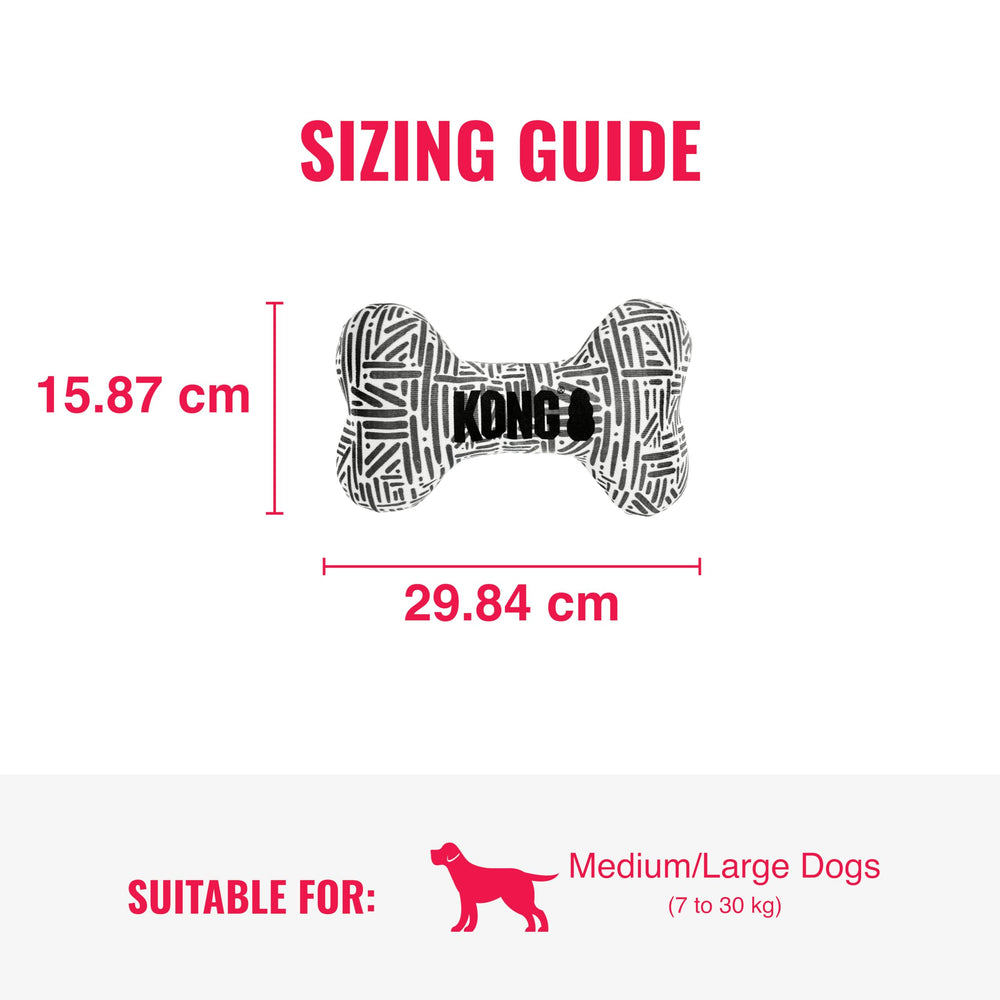 KONG Maxx Bone MD in hand during interactive playtime.