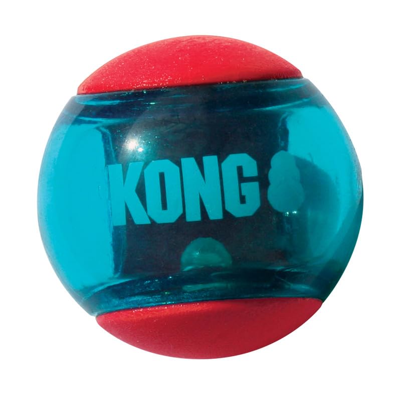 KONG Squeezz Action Ball in indoor/outdoor setting for versatile play.