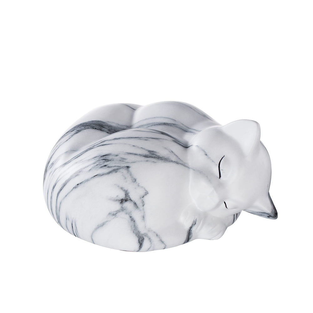 Kriss Art pet urn white on shelf blends with decor during remembrance.