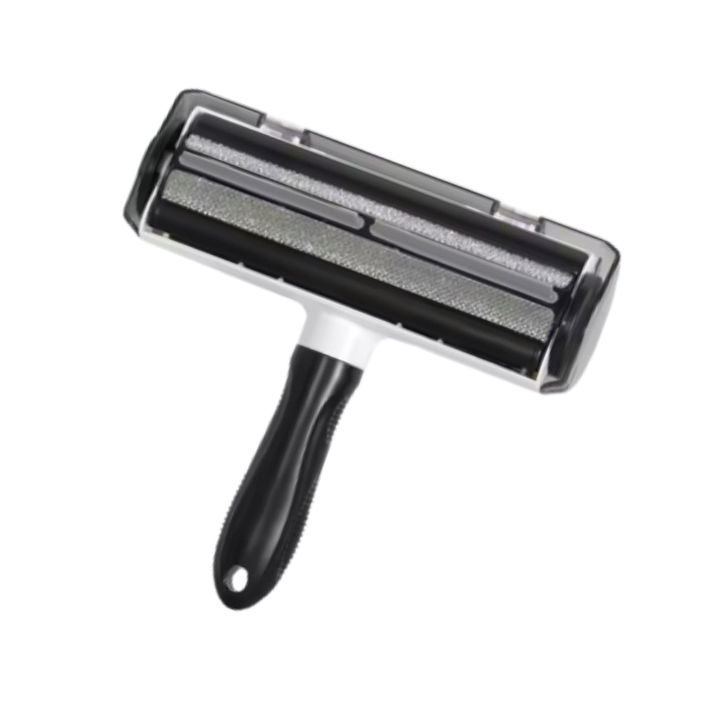LA Paws and Claws lint roller in use shows built-in chamber for easy disposal.