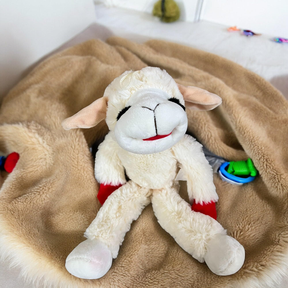 Lamb Chop dog toy 14 squeaker adds playful engagement during fetch.