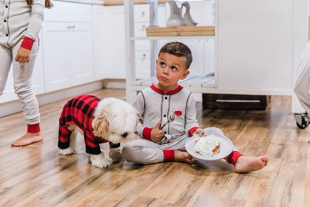 LazyOne dog pajamas plaid large model wearing matching family sleepwear.