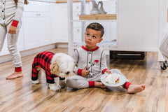 LazyOne dog pajamas plaid large model wearing matching family sleepwear.