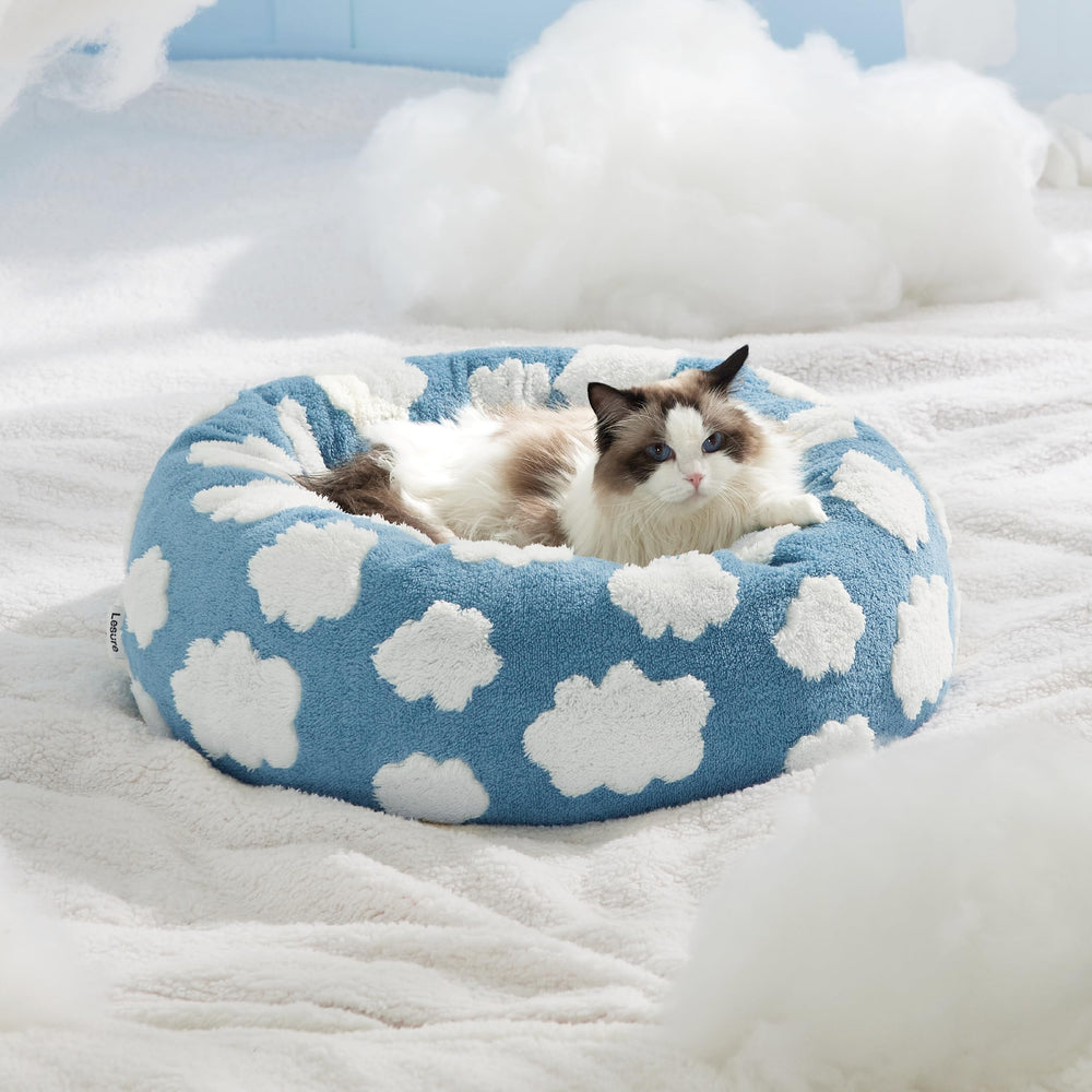 LE SURE Donut Cat Bed blue foam-centered interior supports plush lounging.