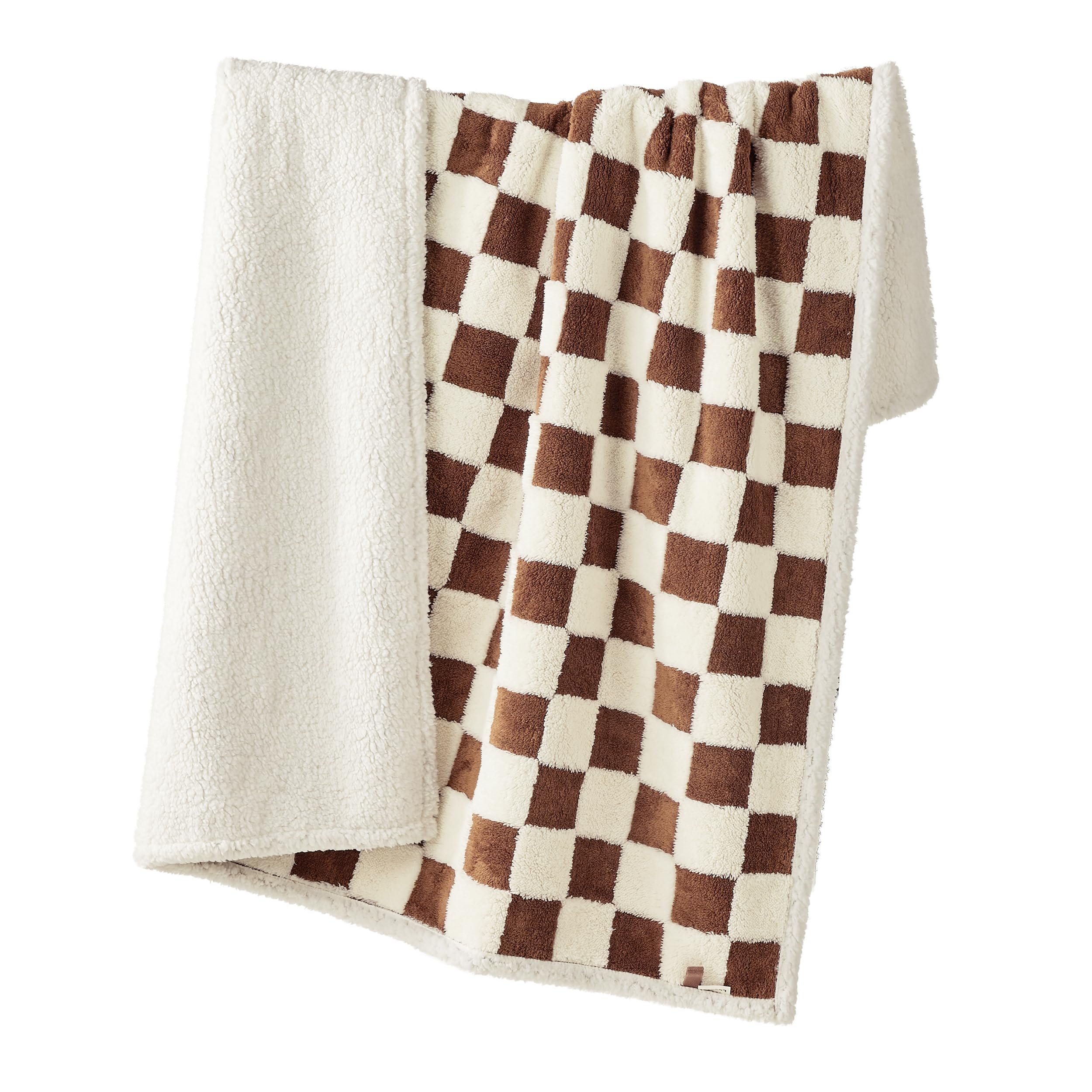 LE SURE couch-protection blanket demonstrates easy draping over sofas and beds.