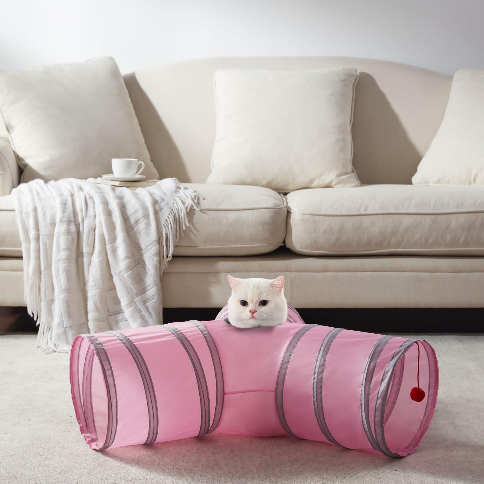 LeamStyle Home cat tunnel ball inside stimulates interactive play.