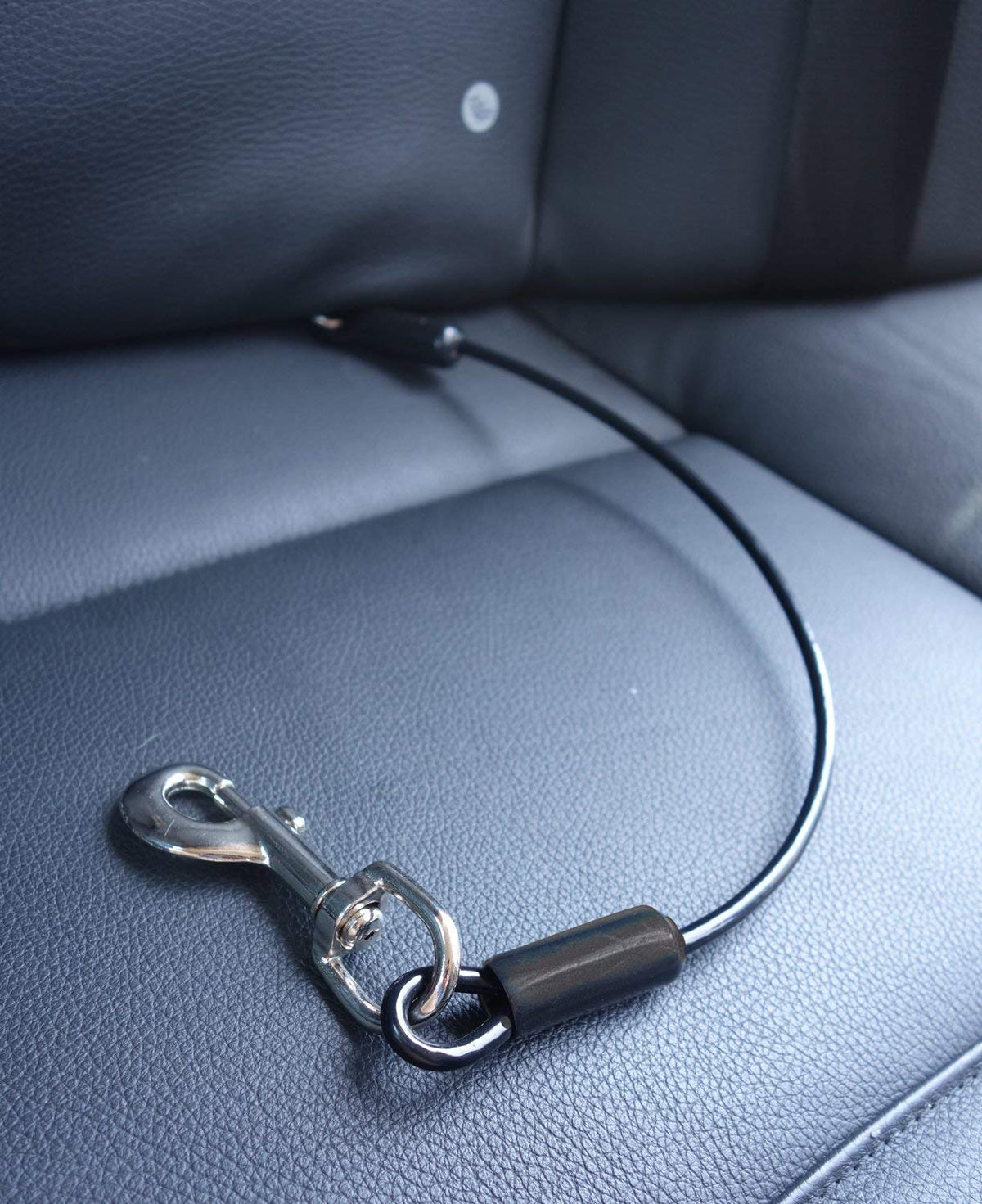 Leashboss chew-proof rope car seatbelt keeps dogs secure during travel.