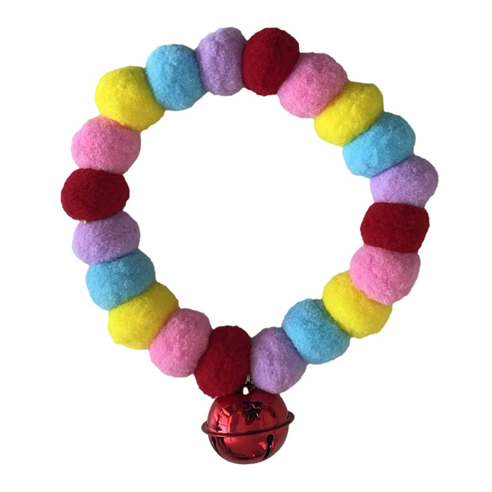 Leconpet pom pom dog collar closeup in red-pink showing playful style and vibrant texture.