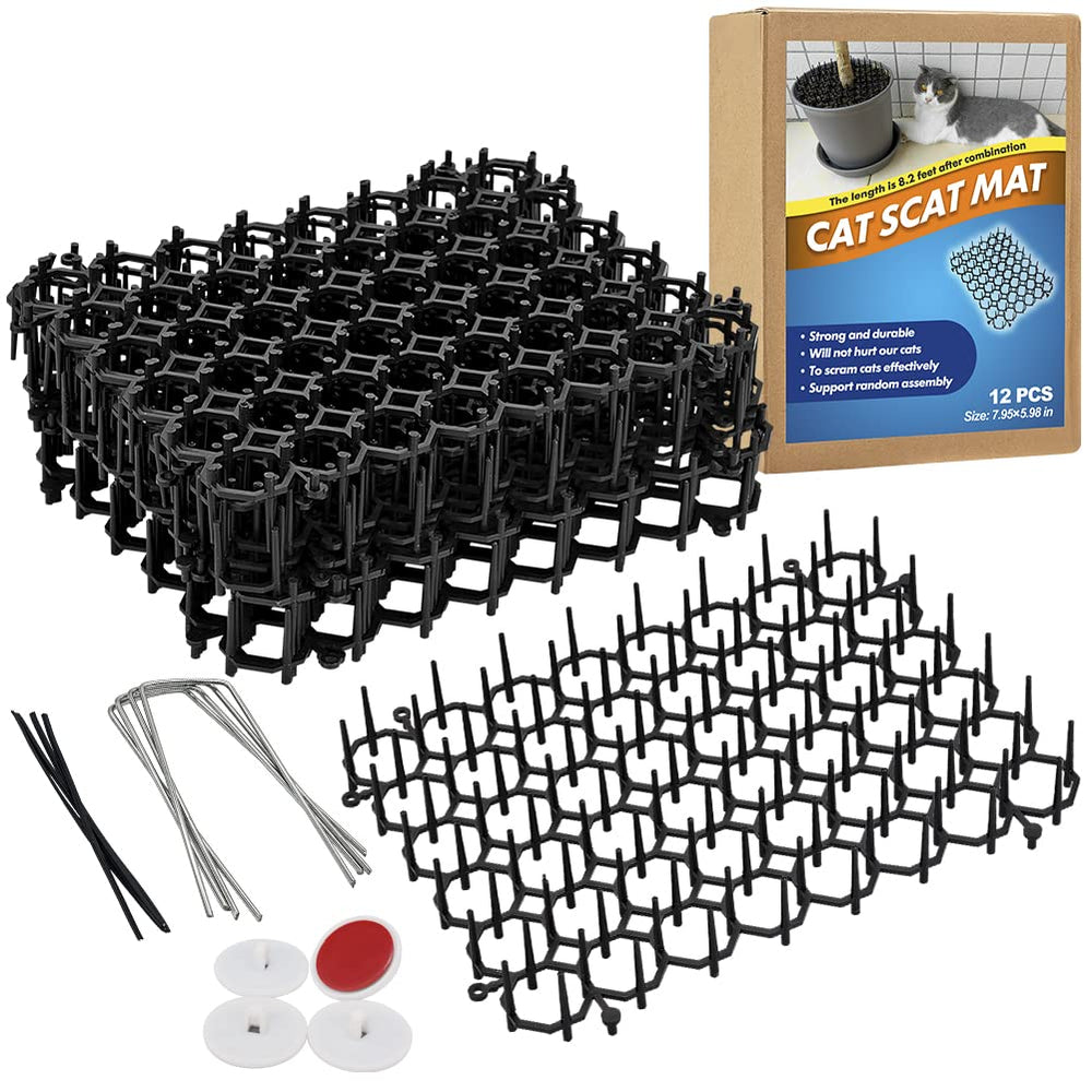 Ley's cat deterrent mat 6x8in in garden setup protects plants from digging.
