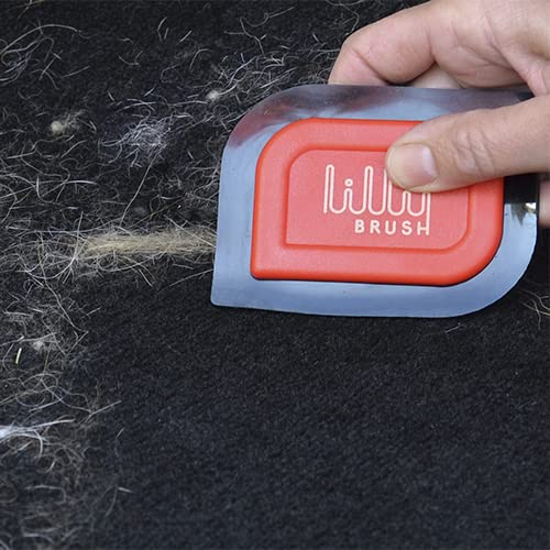 Lilly Brush Mini Pet Hair Detailer in hand shows easy grip for quick fur removal.