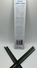 Liquid Gardens Shrimp Candy Stick feeding moment in aquarium creates interactive feeding.