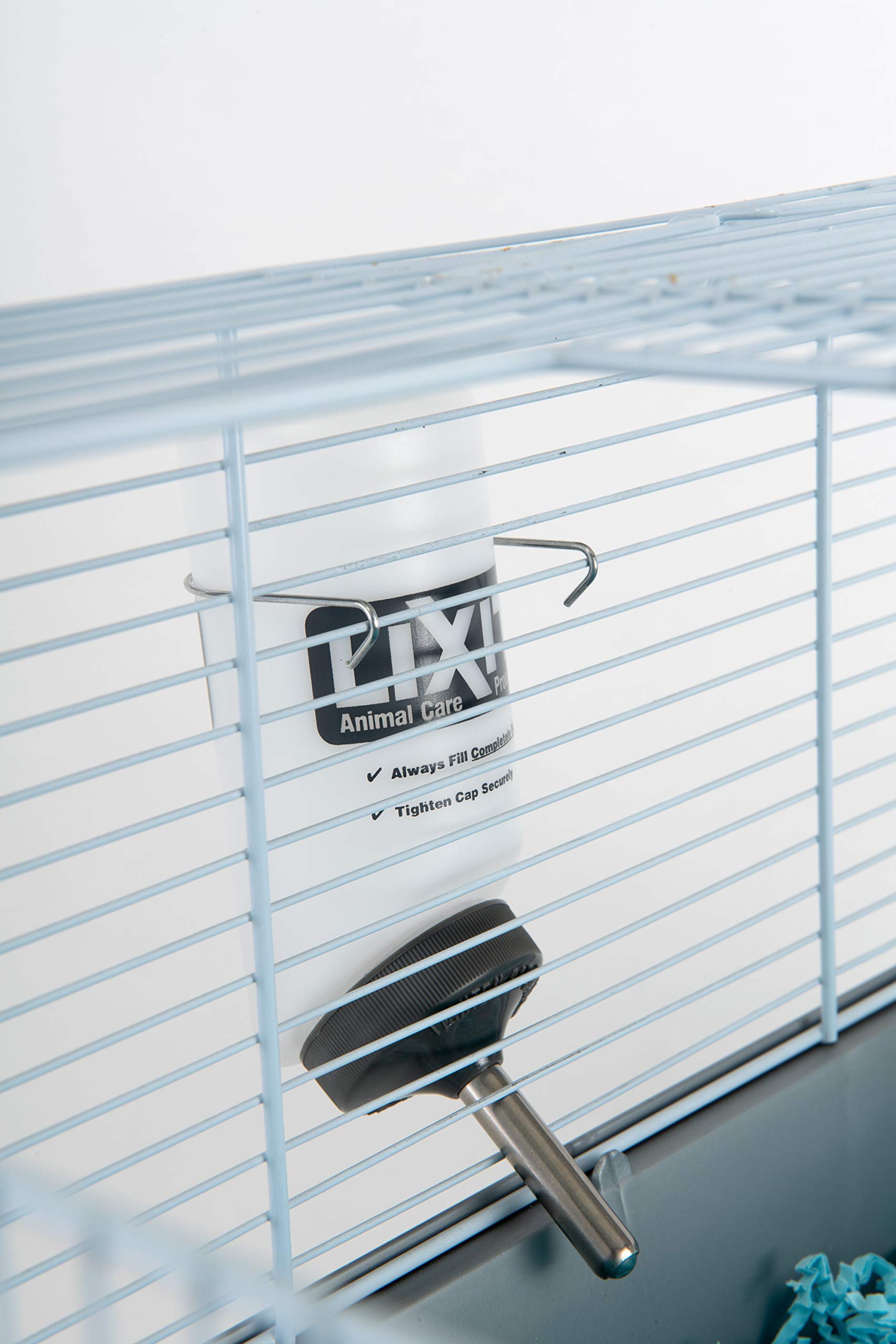 Lixit bottle tube pour detail highlighting vacuum-seal to minimize spills