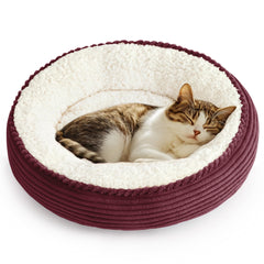 Love's cabin round donut bed burgundy stripe closeup shows plush comfort and inviting texture.