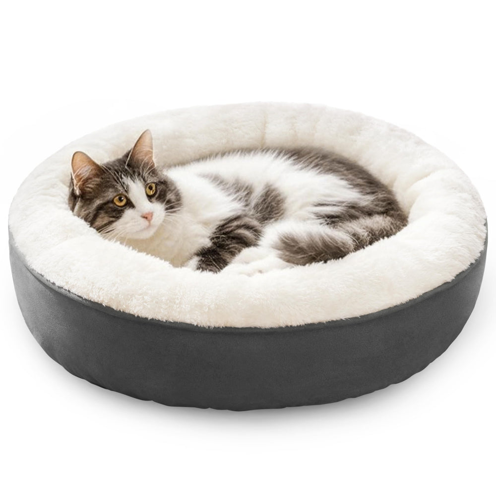 Love's cabin round-donut-bed front view shows cozy nest walls for secure naps.