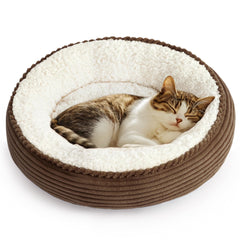 Love's cabin round donut bed front view shows cozy nest design for calm naps.