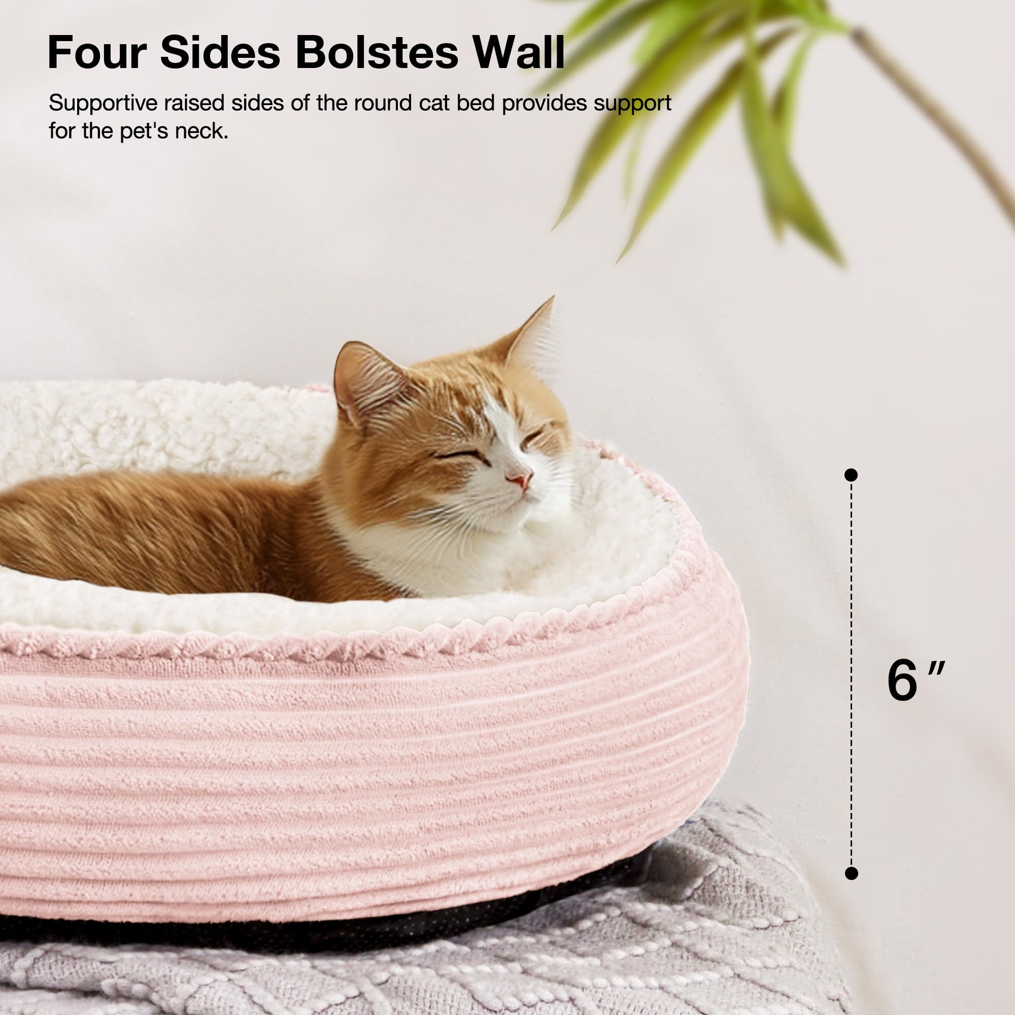 Love's cabin round bed pink stripe side view shows raised rim for neck and head support.