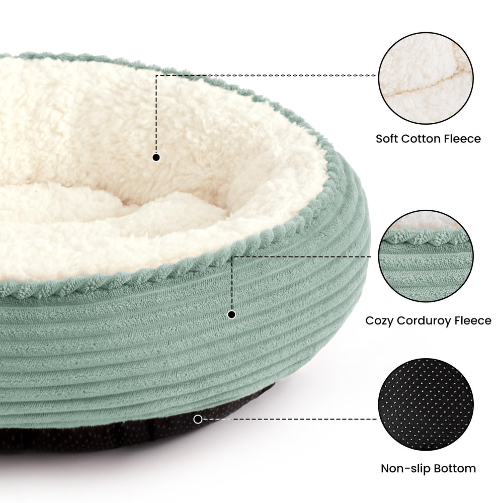 Love's cabin round donut bed raised rim closeup emphasizes neck support and cozy security.