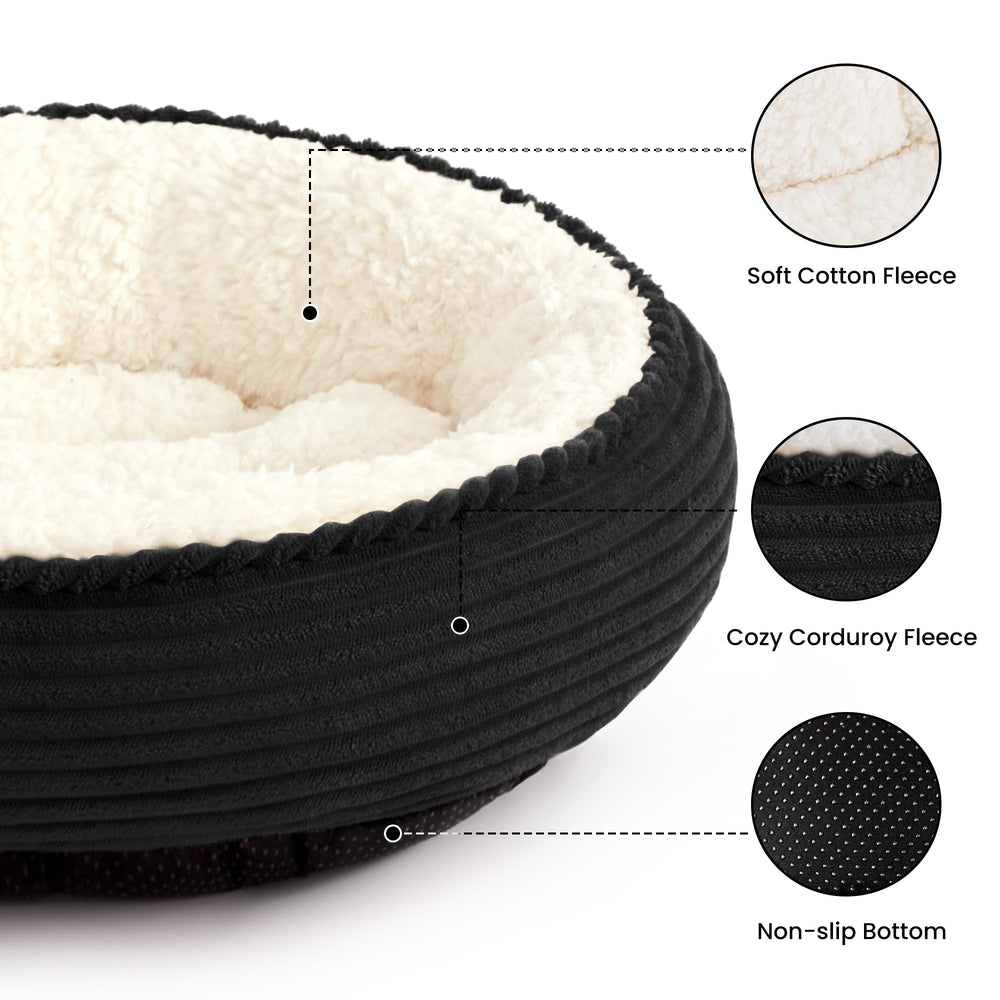 Love's cabin round donut bed side view highlights raised rim for head and neck support.