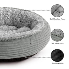 Love's cabin round donut bed top view reveals plush rim for neck support.