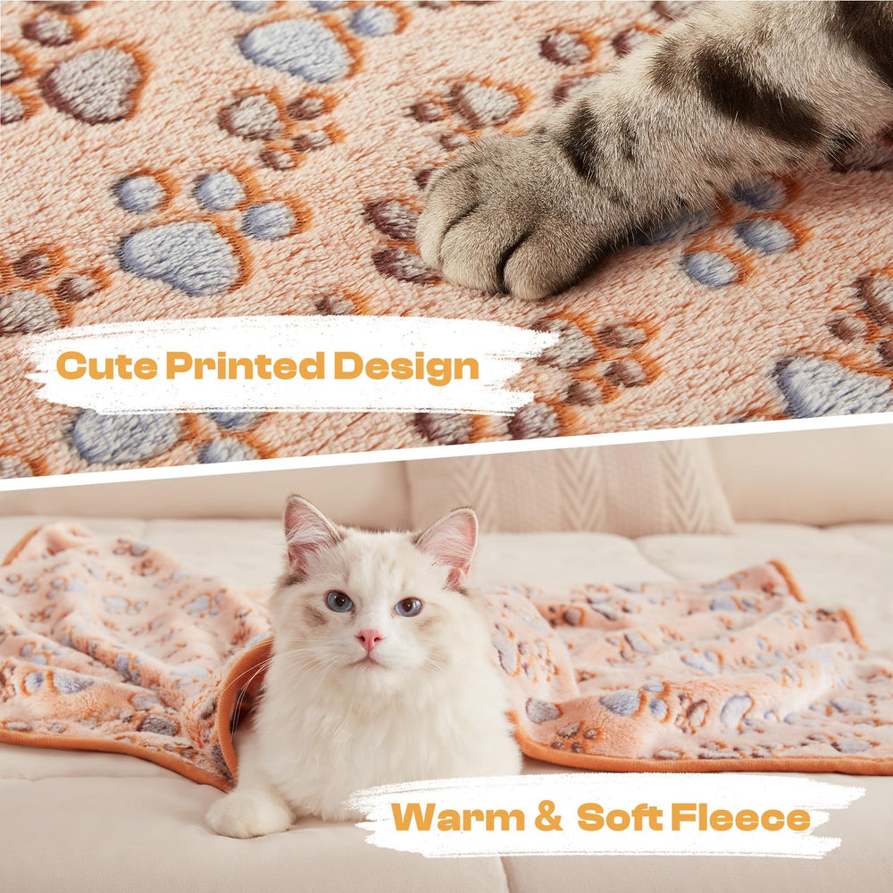 Luciphia paw-print pink pet blanket offers soft warmth suitable for cozy naps.