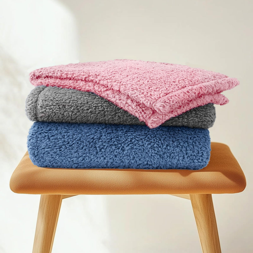 Luciphia blanket fits inside pet carrier for travel comfort.