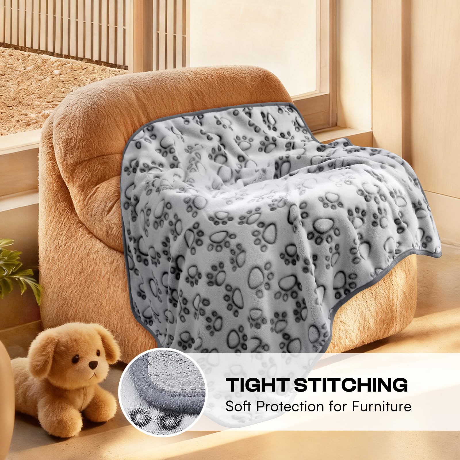 Luciphia paw-print blanket on cat bed showcases versatility for pets