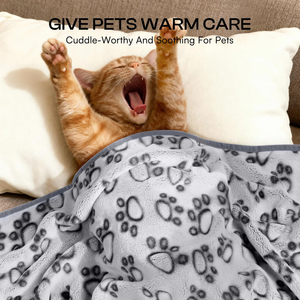 Luciphia paw-print blanket on sofa demonstrates furniture protection and style