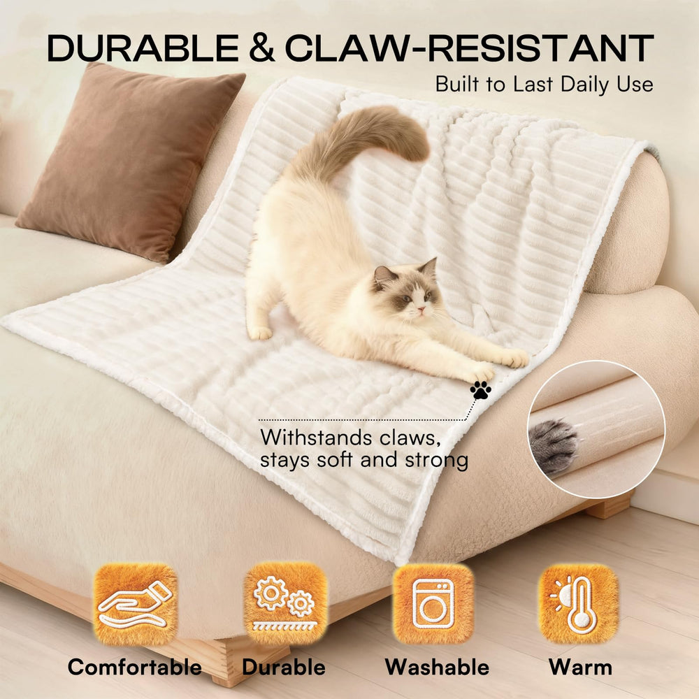 Luciphia XL on sofa providing versatile couch protection and comfort
