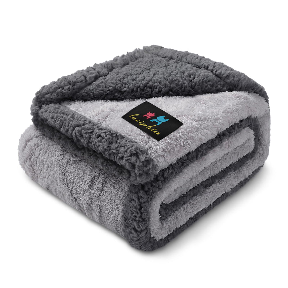 Luciphia waterproof pet blanket on sofa showing spill protection and durability