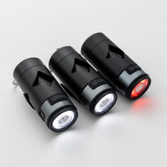 Lumi Pawtners Lumi-dog-waste-bag-holder-led-flashlight clipped on belt for quick cleanup.
