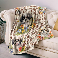 Lussues Nee Shih Tzu Blanket on sofa highlighting versatile living room accessory