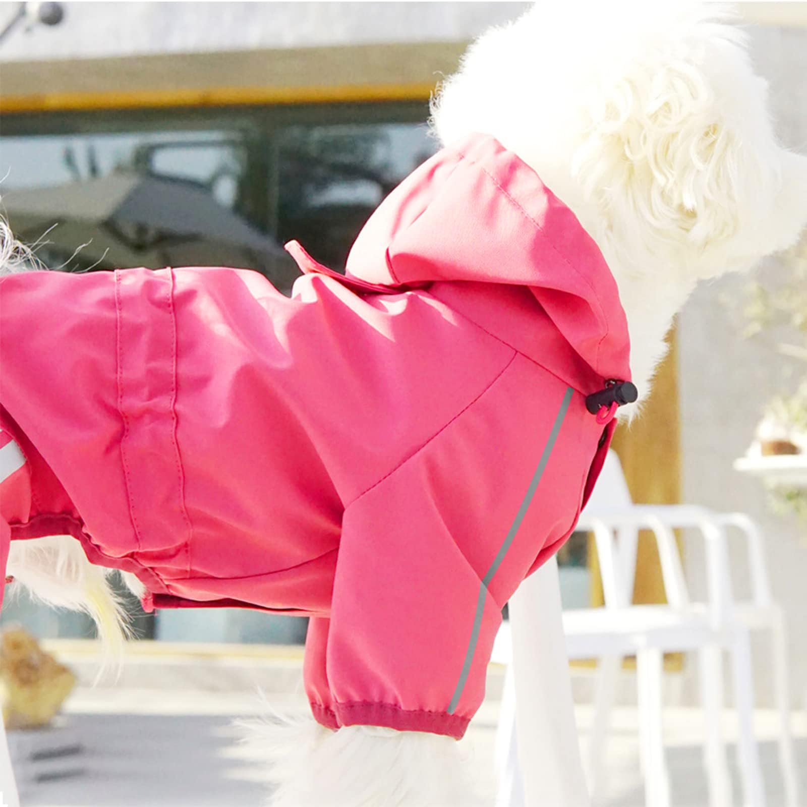 Mabawa raincoat shows neck and waist adjustment for a secure fit