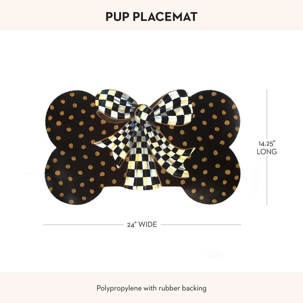 MACKENZIE-CHILDS Gold-dots-on-black surface adds luxe contrast to meals.
