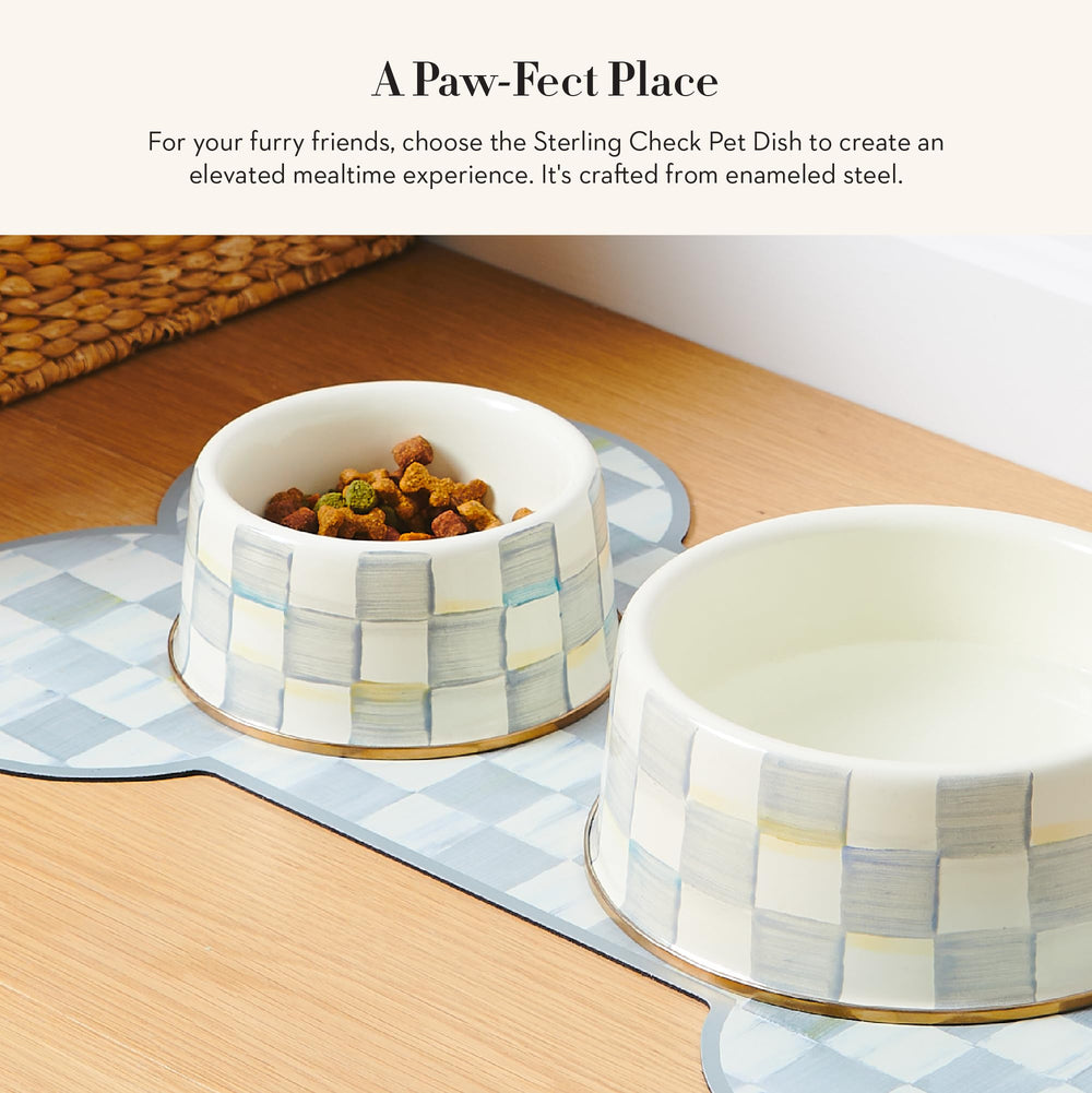 Mackenzie-Childs pet bowl gray-and-white Sterling Check enhances dining decor.