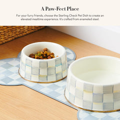 Mackenzie-Childs pet bowl gray-and-white Sterling Check enhances dining decor.