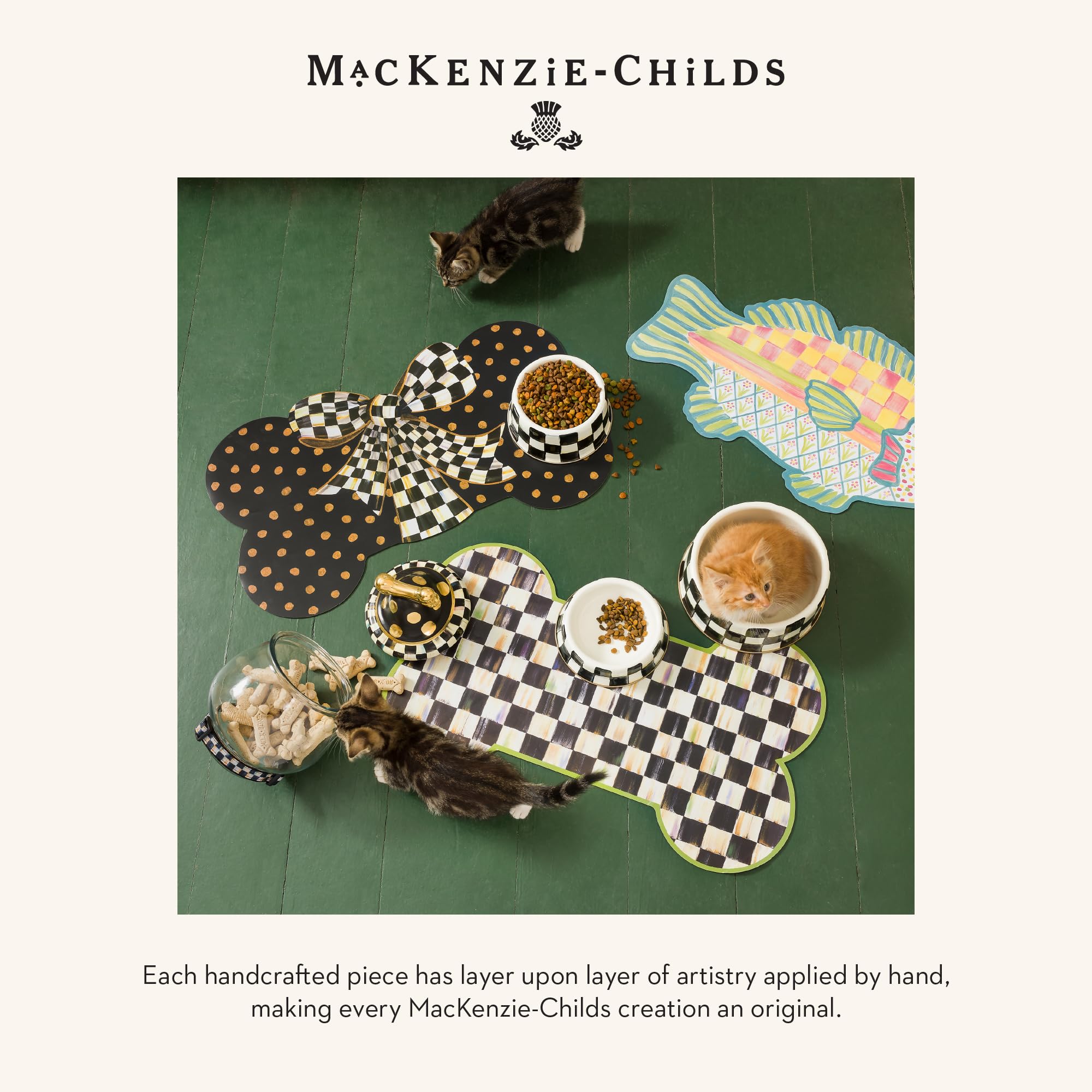 Mackenzie-Childs Pup Placemat indoor-outdoor use suits versatile pet dining spaces.