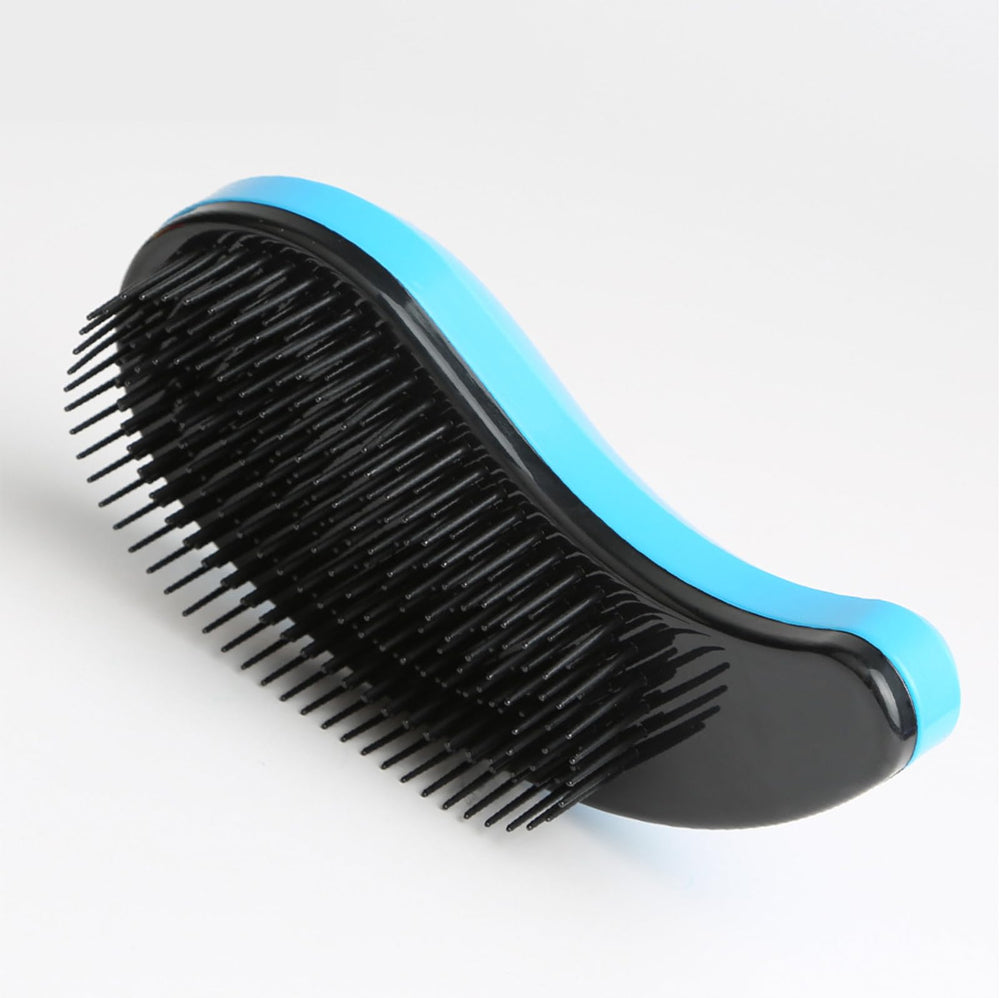MAEELOU tiny-breed brush keeps Teddy Shih Tzu coats tidy.
