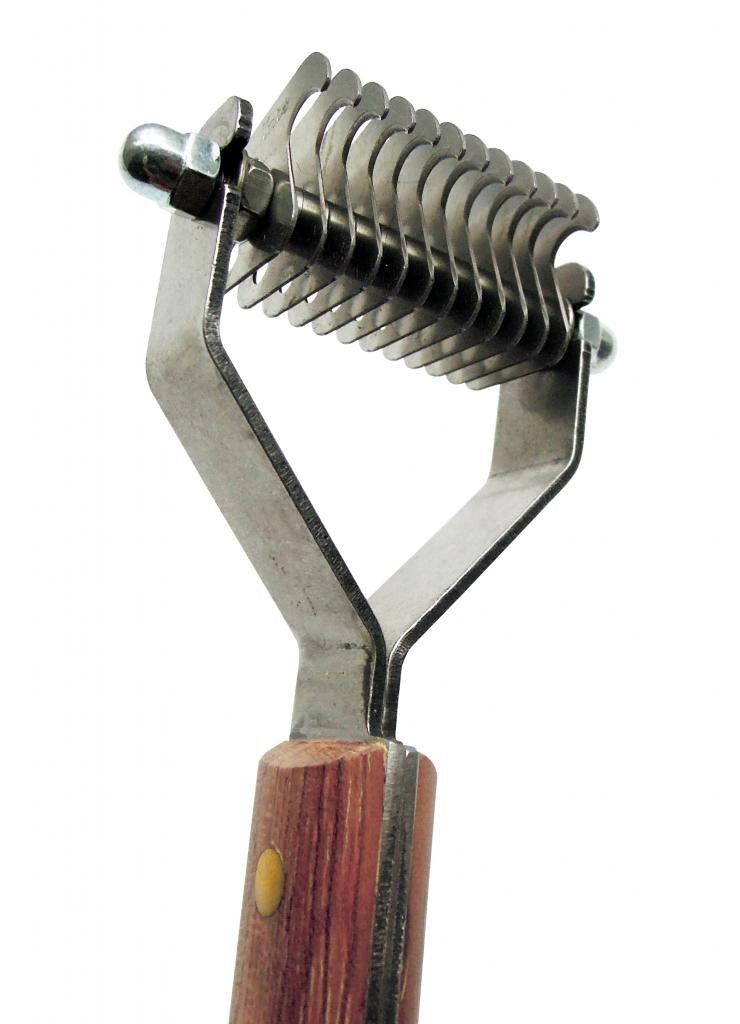 Mars Coat King 12-blade stripper targets thick dog and cat coats efficiently.