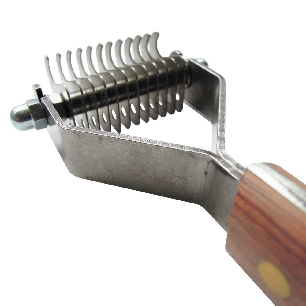 Mars Coat King stainless steel blades close-up highlighting durable dematting action.