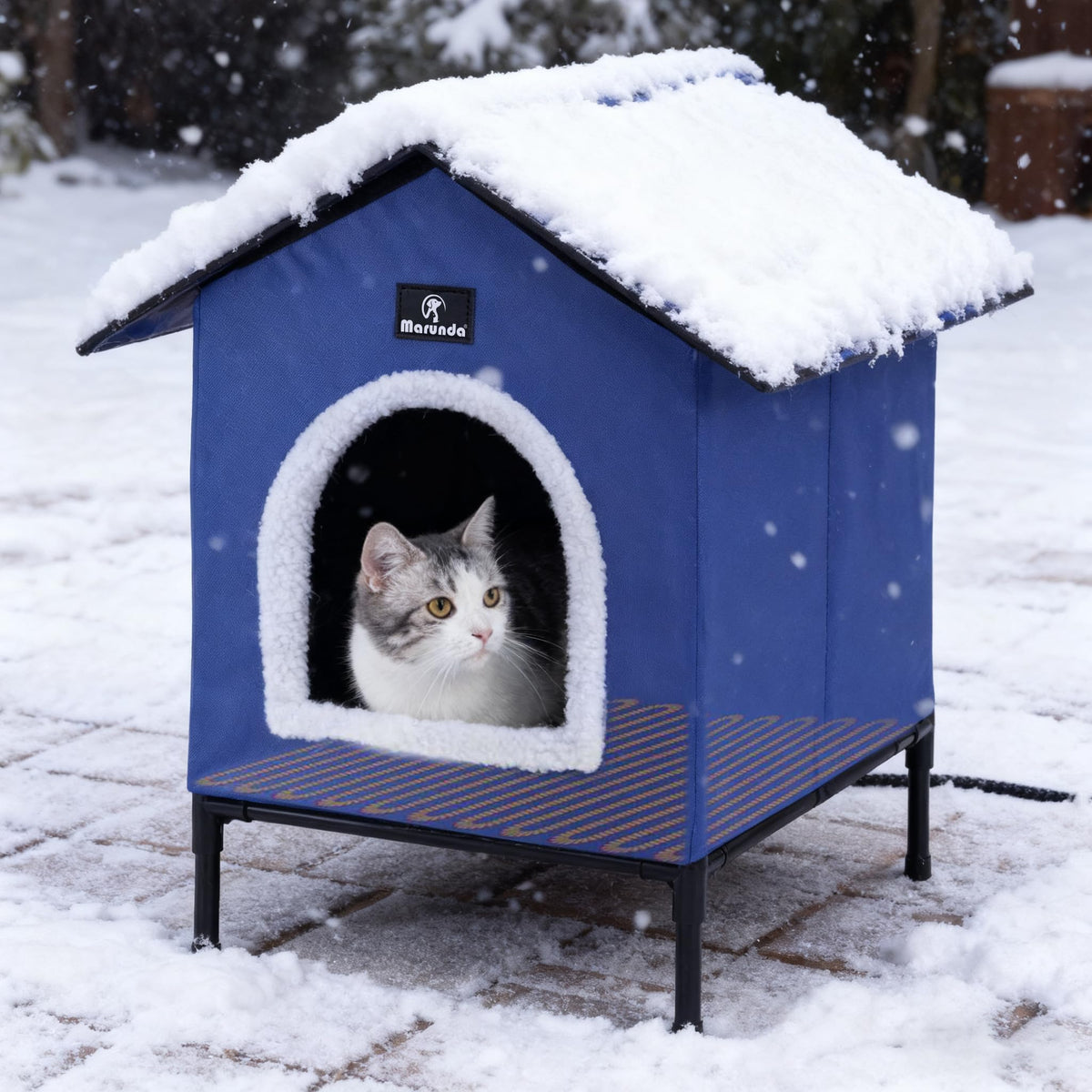 MARUNDA heated cat house outdoors provides a warm winter retreat for outdoor cats