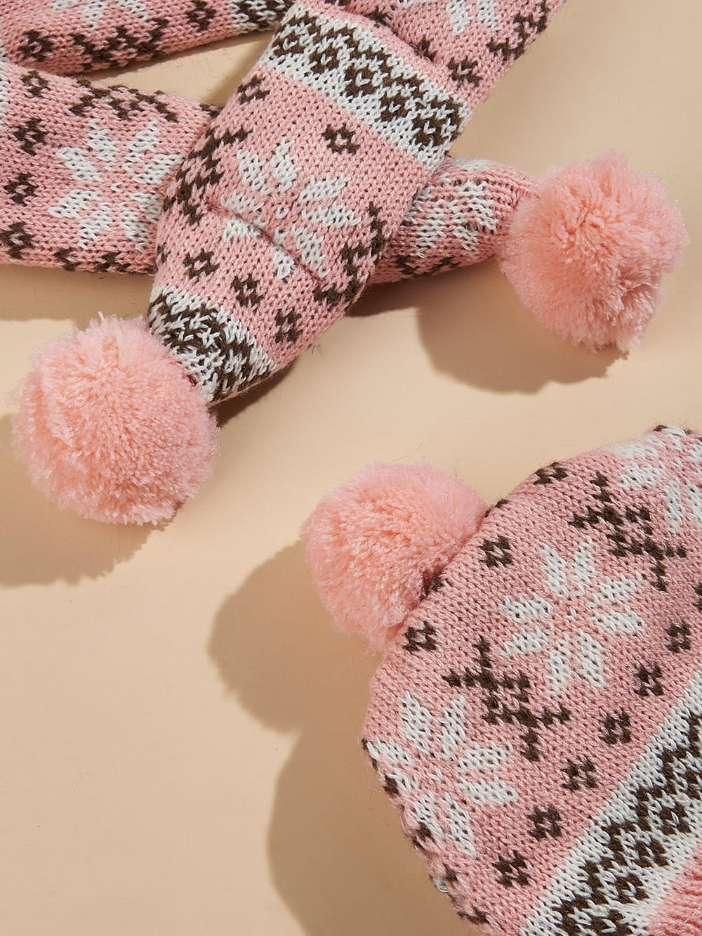 MaruPet knit dog scarf provides snug warmth for winter walks.